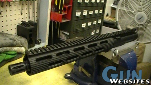 Free-float rifle handguard with M-LOK slots