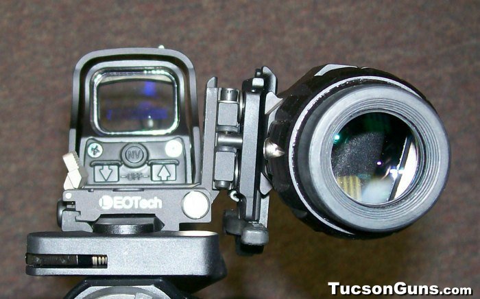 Scoped AR-style rifle ready on the range